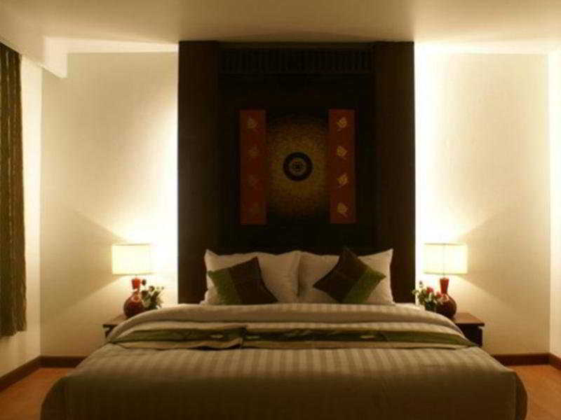 Aiyara Palace Pattaya Exteriér fotografie A bedroom at the hotel